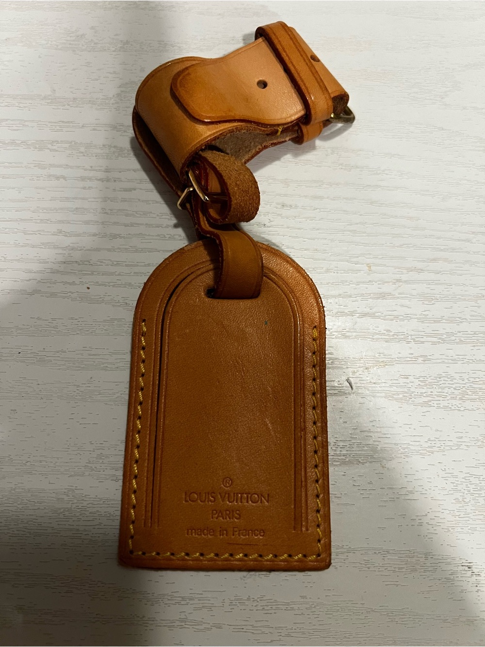 Louis Vuitton travel bag name tag